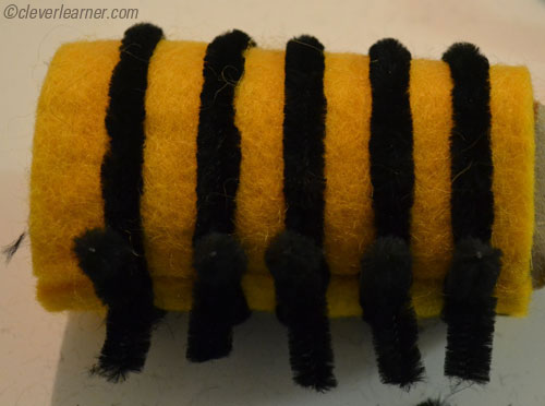 Making the black and yellow stripes of the bee